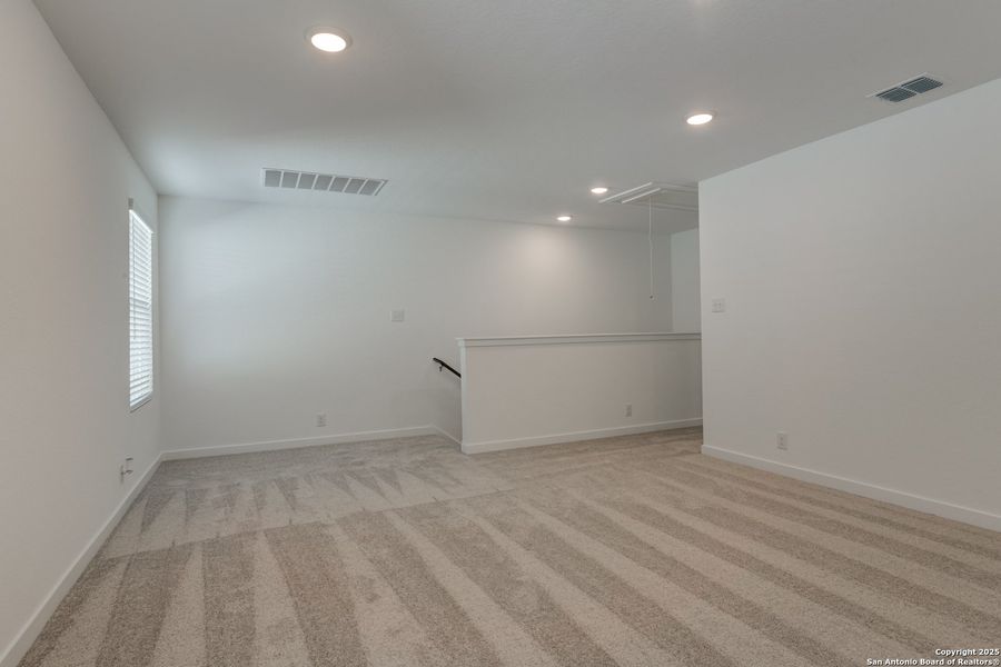 Spacious, unfurnished interior of a new home in The Preserve at the Wilder, Adkins (Image 20).