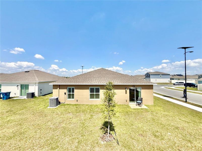 Exterior details and patio area of a home in Ranches at Lake McLeod, Eagle Lake (Image 4).