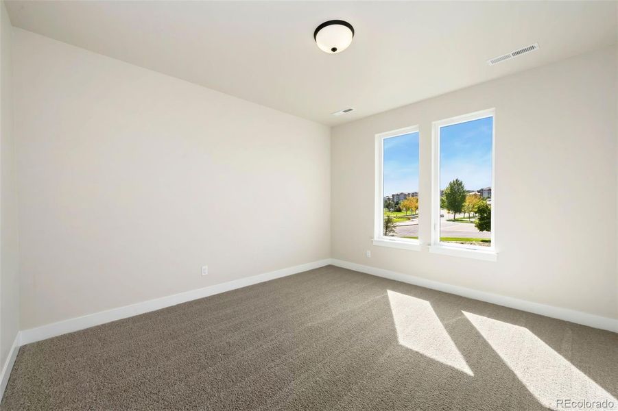 Spacious, unfurnished interior of a new home in Pelican Shores at Water Valley, Windsor (Image 15).