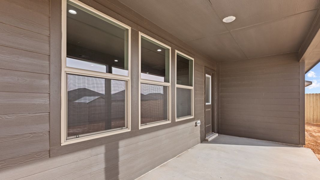 Representative furnished interior of a home built from the JUSTIN by D.R. Horton in Homestead at Parks Bell Ranch, Odessa (Image 6).
