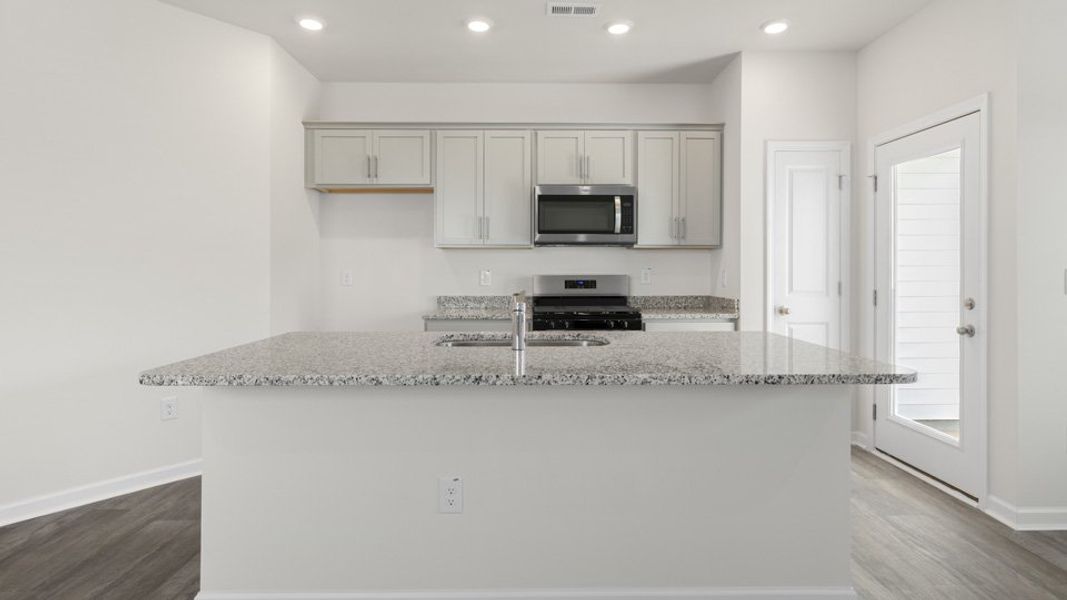 Furnished interior view inside a new home in The Townes at Ridgewood Farms, Winterville (Image 4).
