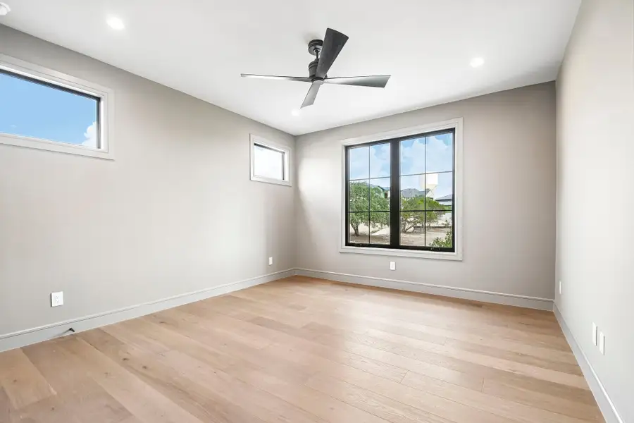 Spacious, unfurnished interior of a new home in The Overlook at Westlake, Austin (Image 36).