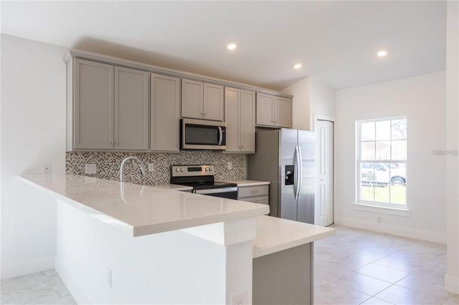 Furnished interior view inside a new home in , Port Charlotte (Image 12).