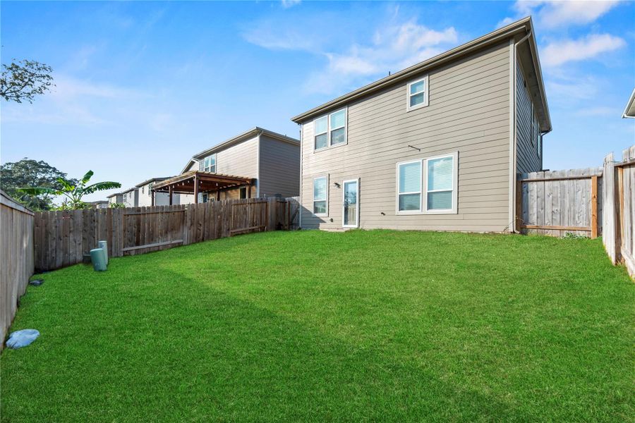 Private backyard. Grass has been digitally enhanced to show potential. Private backyard. Grass has been digitally enhanced to show potential.