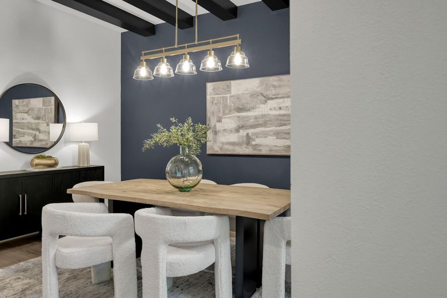 View from living toward dining area showing cohesive design flow. View from living toward dining area showing cohesive design flow.