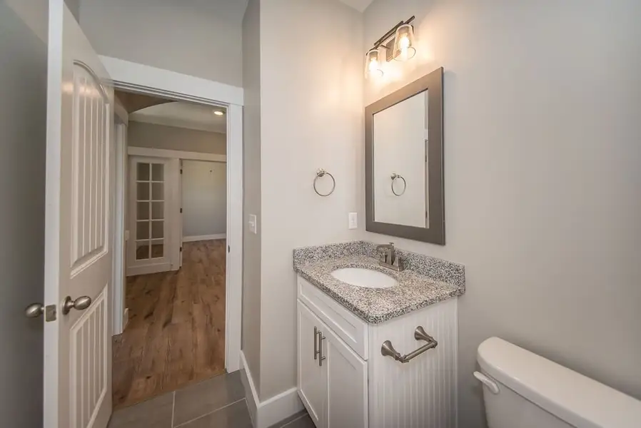 Representative furnished interior of a home built from the Beaumont Elite by Enchanted Homes in Smokey Hills, Campobello (Image 7).
