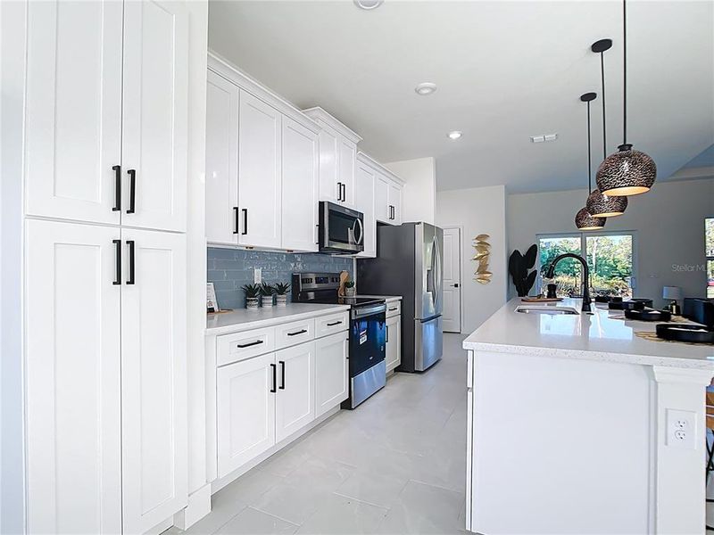 Furnished interior view inside a new home in , Lehigh Acres (Image 8).