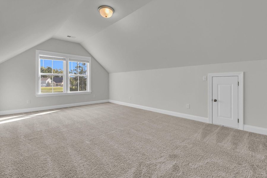 Spacious, unfurnished interior of a new home in Tidewater at Lakes of Cane Bay, Summerville (Image 21). Spacious, unfurnished interior of a new home in Tidewater at Lakes of Cane Bay, Summerville (Image 21).