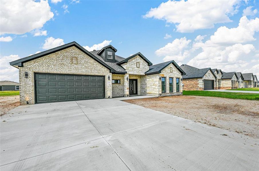 View of front of home with a garage