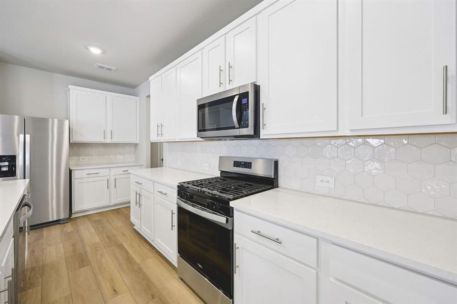Furnished interior view inside a new home in Stonehaven, Seagoville (Image 15).