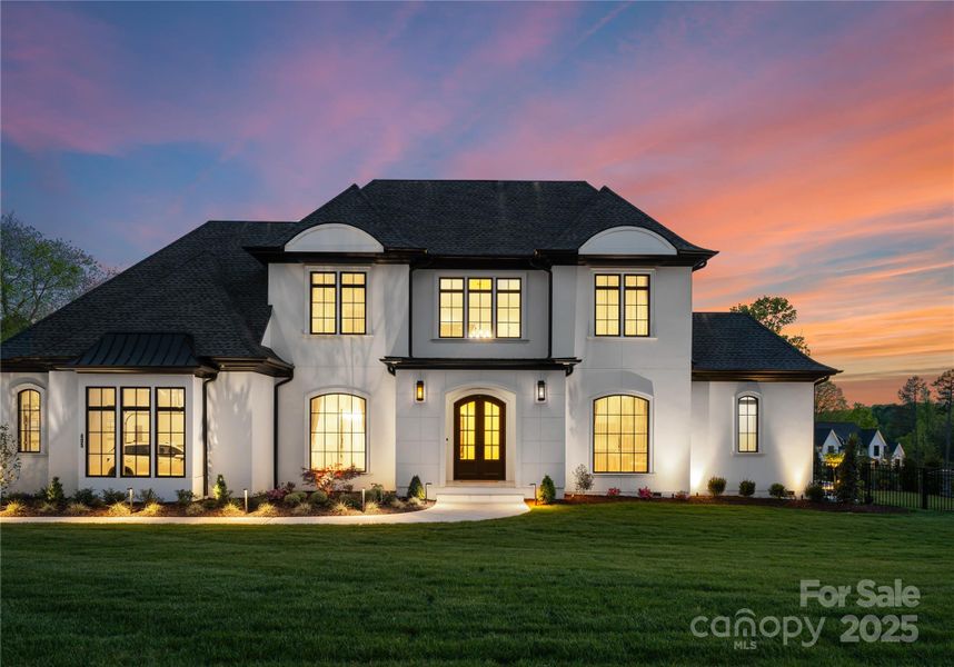 Front exterior of a new home in , Weddington, NC, highlighting curb appeal (Image 1).