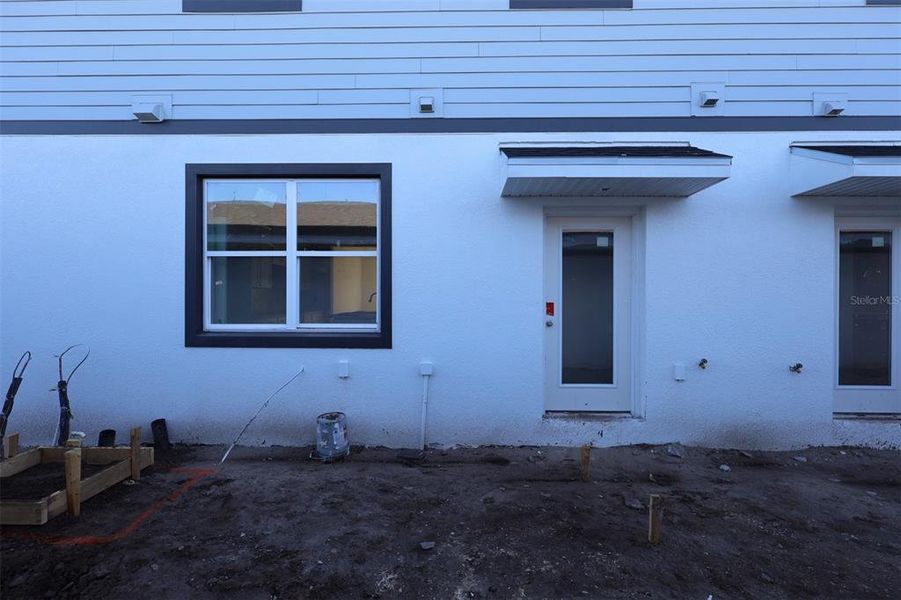 Exterior details and patio area of a home in Center Lake on the Park, St. Cloud (Image 3).
