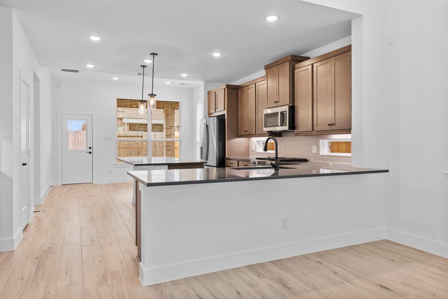 Furnished interior view inside a new home in Wood Leaf Reserve, Tomball (Image 10).