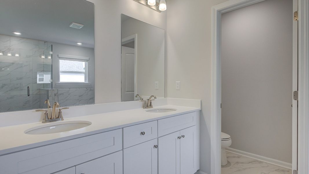 Furnished interior view inside a new home in Hamilton Lakes, Loganville (Image 30).