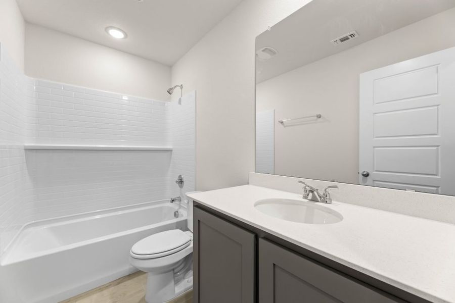 Representative exterior photo of a completed home built from the Lexington by Impression Homes in Baker Farms, Cleburne, TX (Image 24).