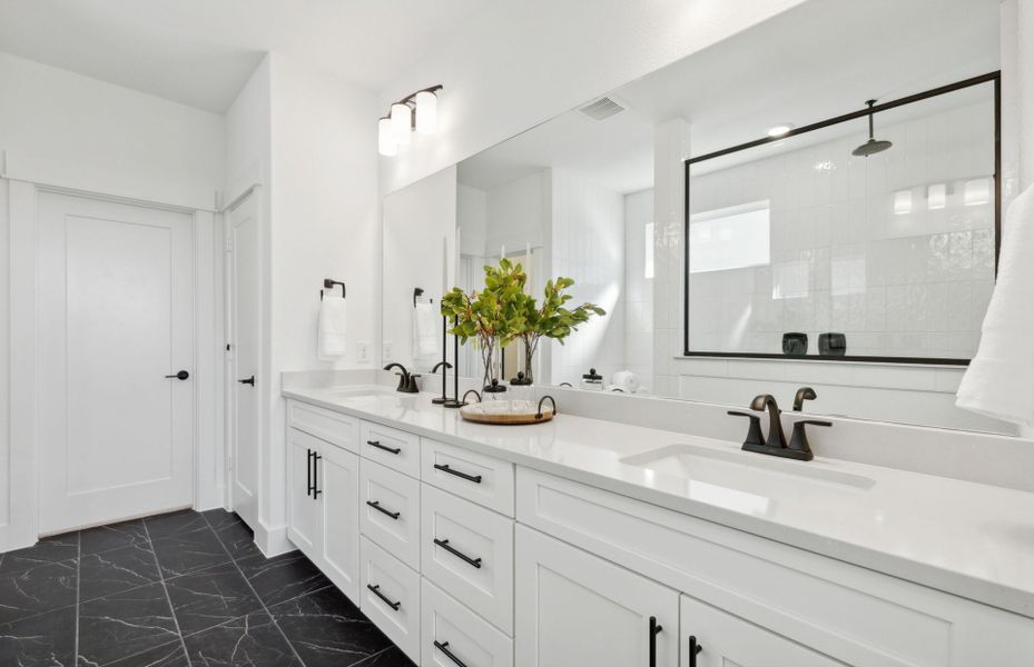 Double vanity in owner's bath