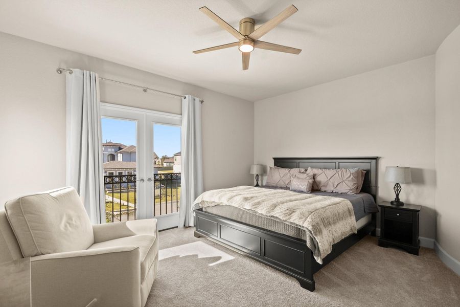 Bedroom with carpet floors, access to outside, a ceiling fan, and french doors Bedroom with carpet floors, access to outside, a ceiling fan, and french doors