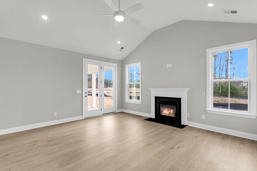 Spacious, unfurnished interior of a new home in Tidewater at Lakes of Cane Bay, Summerville (Image 37).