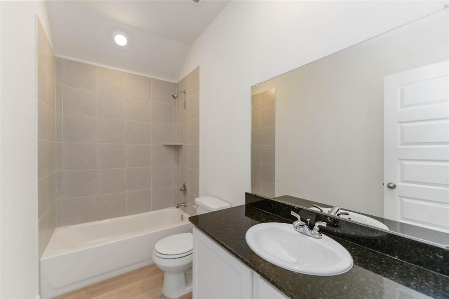 Furnished interior view inside a new home in Granger Pines, Conroe (Image 6).