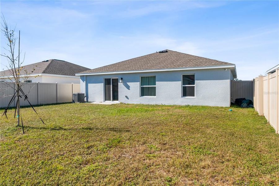 Exterior details and patio area of a home in Peace Creek Reserve: Grand Collection, Winter Haven (Image 17).