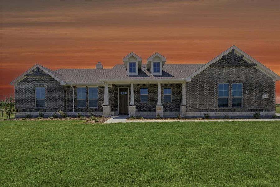 Brick exterior featuring a covered porch with stone columns Brick exterior featuring a covered porch with stone columns