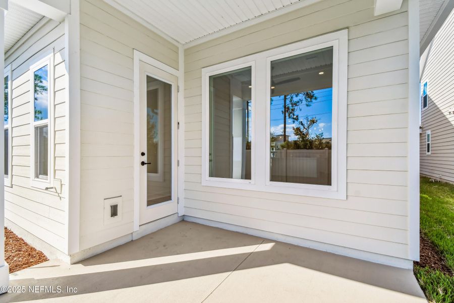 Exterior details and patio area of a home in Crosswinds 40’, Ponte Vedra (Image 2).