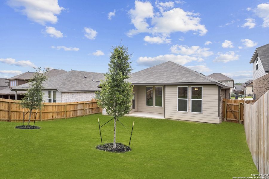 Front exterior of a new home in Comanche Ridge, San Antonio, TX, highlighting curb appeal (Image 18). Front exterior of a new home in Comanche Ridge, San Antonio, TX, highlighting curb appeal (Image 18).