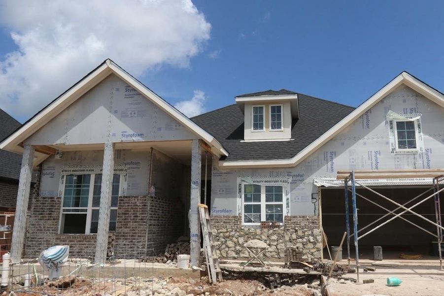 Front exterior of a new home in Brookewater 55’ Homesites, Rosenberg, TX, highlighting curb appeal (Image 1). Front exterior of a new home in Brookewater 55’ Homesites, Rosenberg, TX, highlighting curb appeal (Image 1).