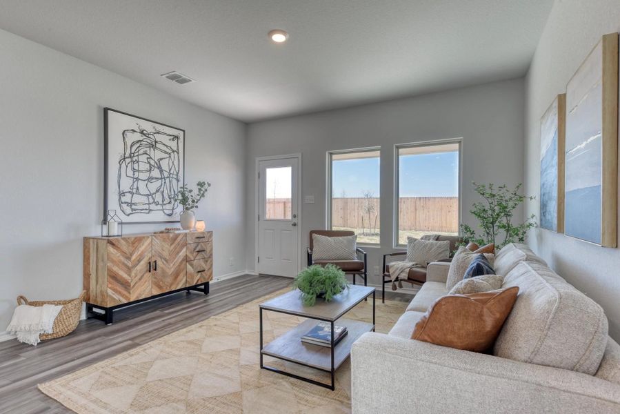 Representative furnished interior of a home built from the Ladybird by Ashton Woods in Meadows at Hennersby Hollow 40's, San Antonio (Image 6).