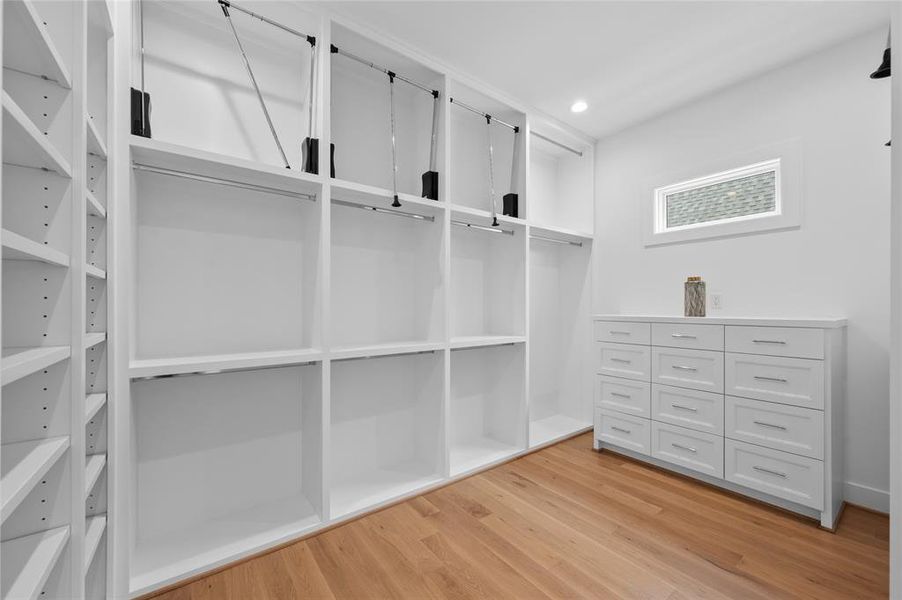 Large primary closet with custom built ins