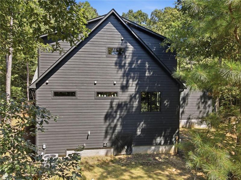 Front exterior of a new home in , Ellijay, GA, highlighting curb appeal (Image 23).