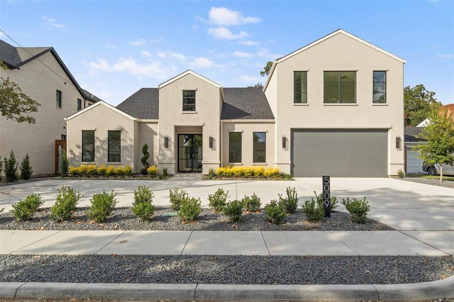 View of front of home featuring stucco siding, concrete driveway, a garage, and a shingled roof View of front of home featuring stucco siding, concrete driveway, a garage, and a shingled roof