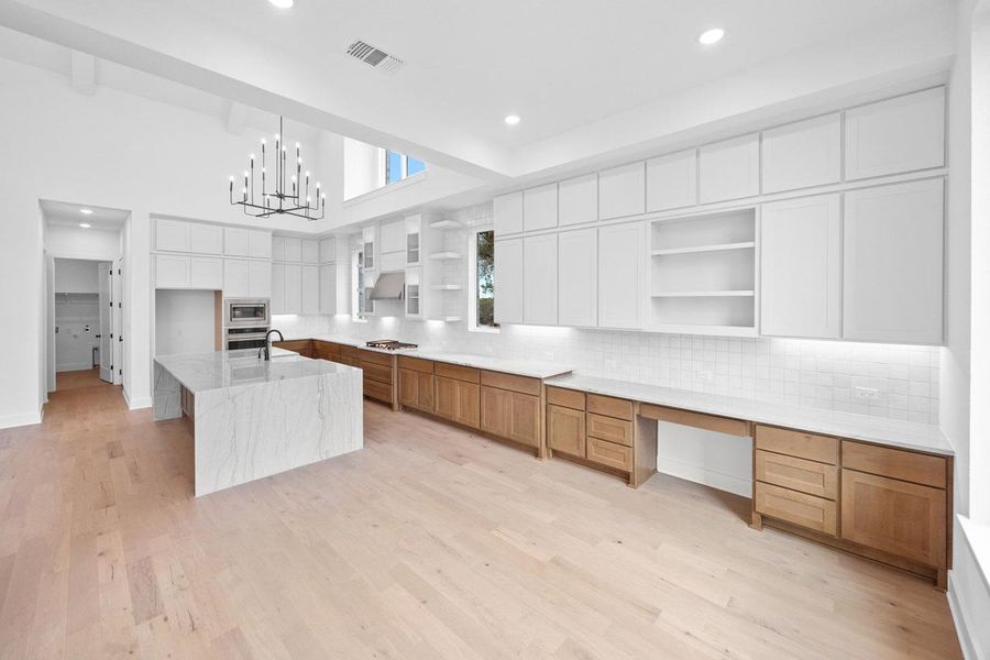 Furnished interior view inside a new home in Parkside On The River, Georgetown (Image 5).