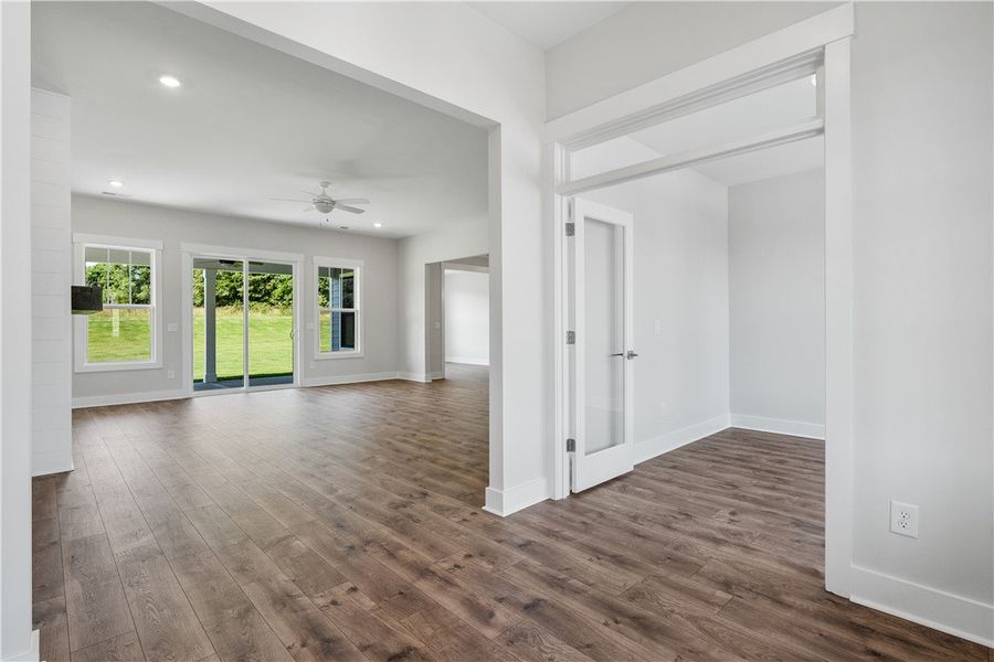 Hardwood floors and natural light define this welc