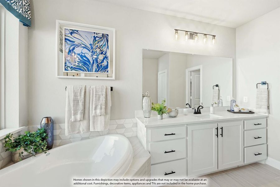 Master bathroom with soaking tub, white vanity with dual sinks, large mirror, and decorative tile backsplash Master bathroom with soaking tub, white vanity with dual sinks, large mirror, and decorative tile backsplash