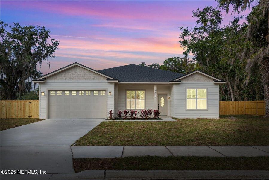 Front exterior of a new home in , Orange Park, FL, highlighting curb appeal (Image 1).