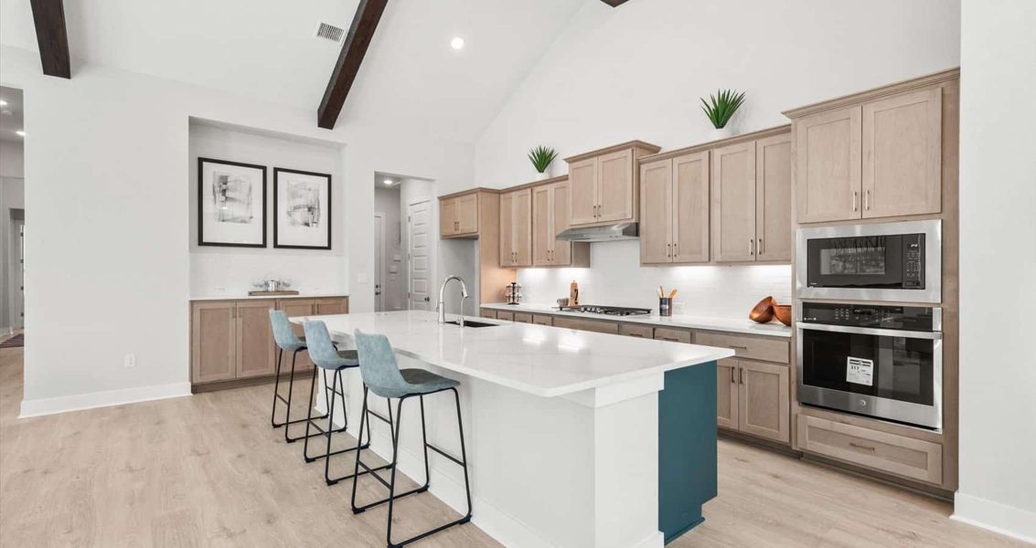 Representative furnished interior of a home built from the Draco by Chesmar Homes in The Grove at Blackhawk, Pflugerville (Image 6).