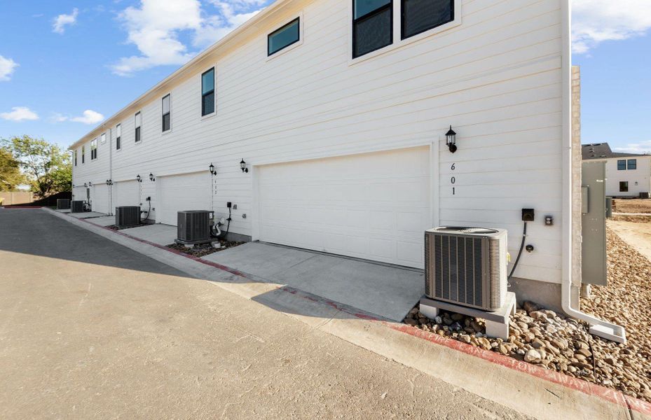 Exterior details and patio area of a home in Monarch on Main, Round Rock (Image 2).