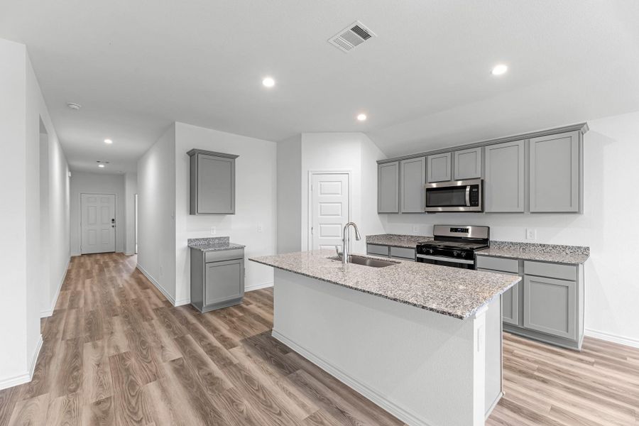 Furnished interior view inside a new home in Reserve at Mallard Lakes, Orange (Image 8).