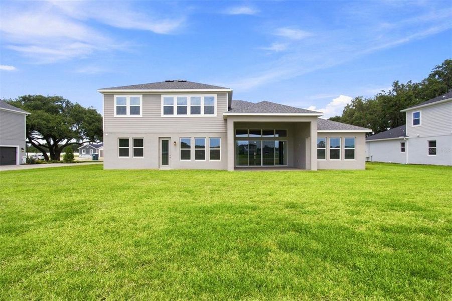 Exterior details and patio area of a home in Solace at Corner Lake, Orlando (Image 16).