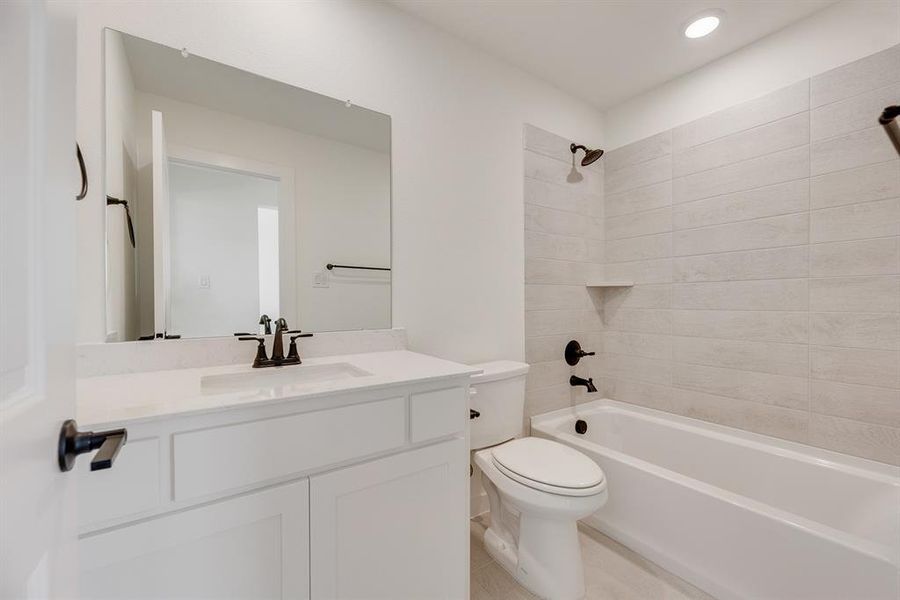 Furnished interior view inside a new home in Light Farms Brenham - 40' Lots, Celina (Image 9).