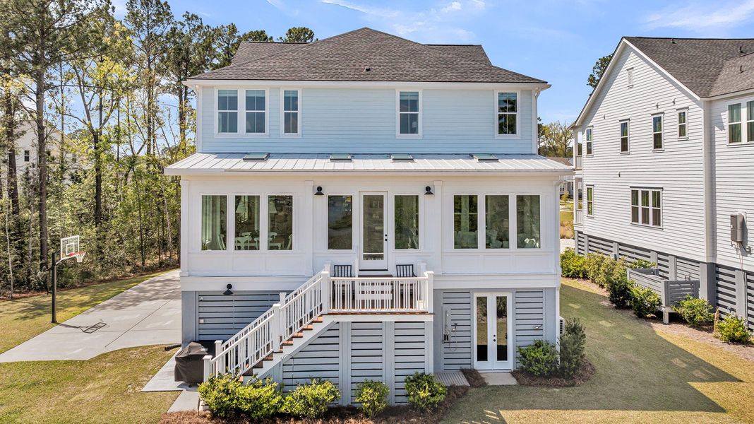 Front exterior of a new home in Carolina Park: Riverside, Mount Pleasant, SC, highlighting curb appeal (Image 26).