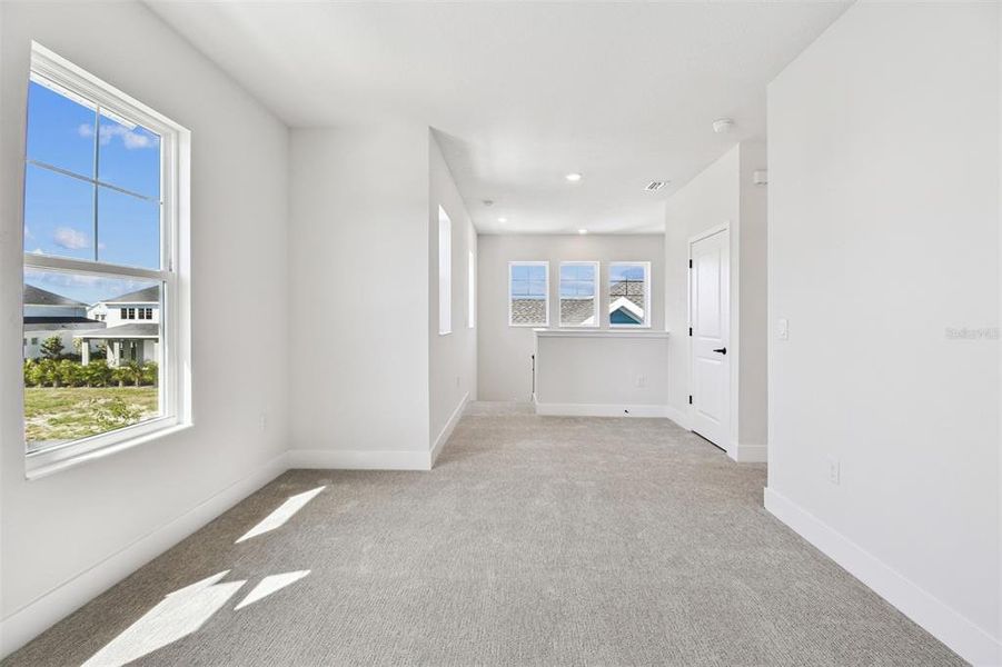 Spacious, unfurnished interior of a new home in Emerald Landing at Waterside at Lakewood Ranch – Cottage Series, Sarasota (Image 31).