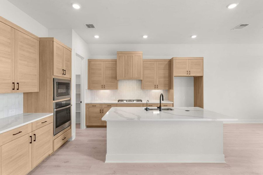Furnished interior view inside a new home in The Grove at Blackhawk, Pflugerville (Image 15).