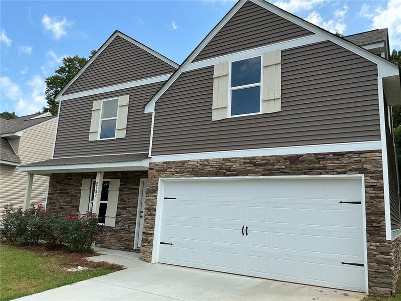 Front exterior of a new home in , Gainesville, GA, highlighting curb appeal (Image 11).