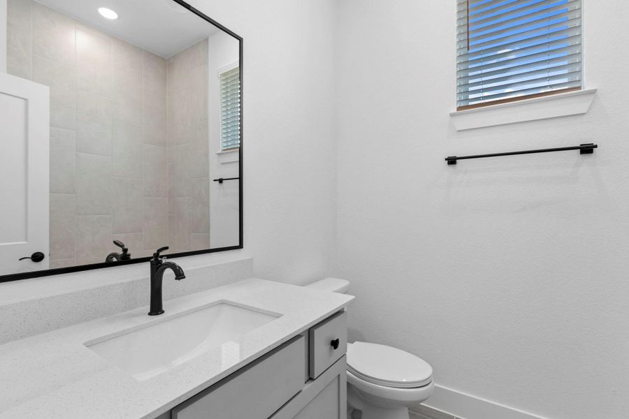 Furnished interior view inside a new home in Bridgeland, Cypress (Image 10).