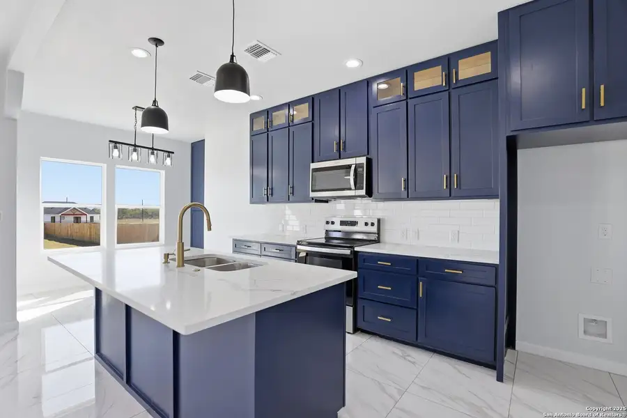 Furnished interior view inside a new home in , Atascosa (Image 6).