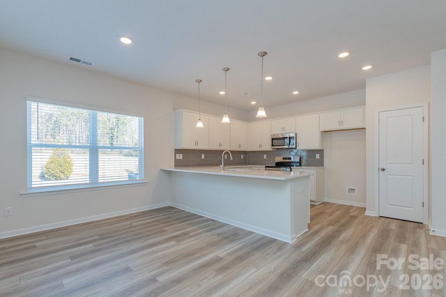 Furnished interior view inside a new home in Country Club Village, Salisbury (Image 9).