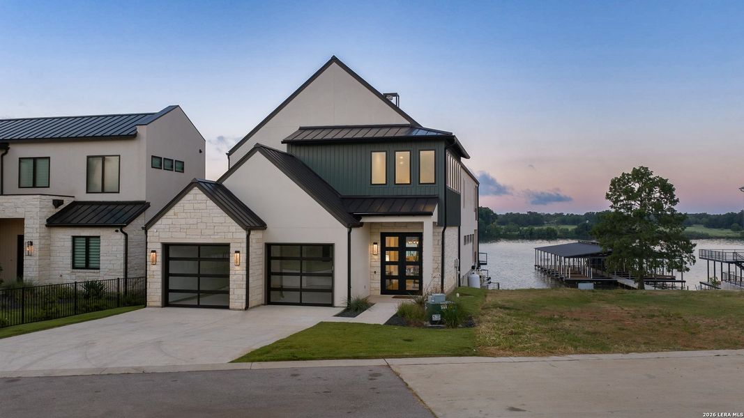 Front exterior of a new home in , Kingsland, TX, highlighting curb appeal (Image 21).
