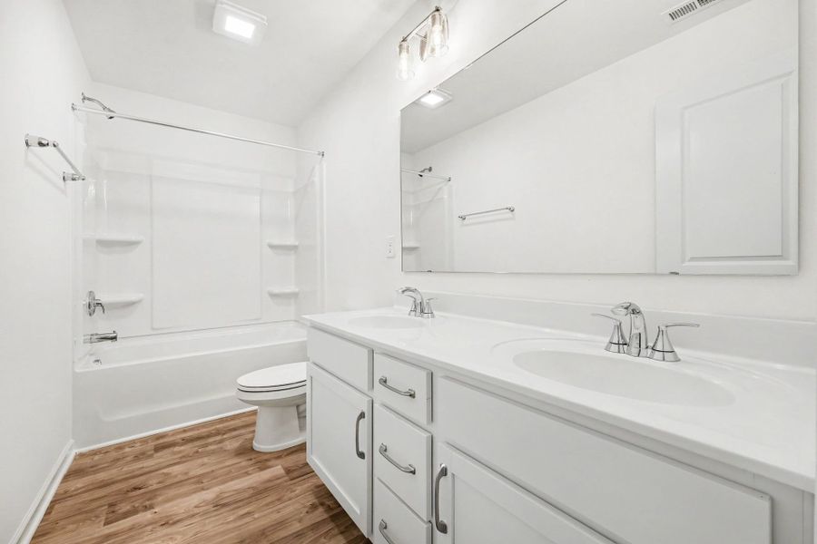 Furnished interior view inside a new home in Lake Royale, Louisburg (Image 11).